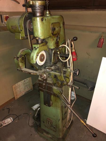 Automat. sawblade sharpening machine